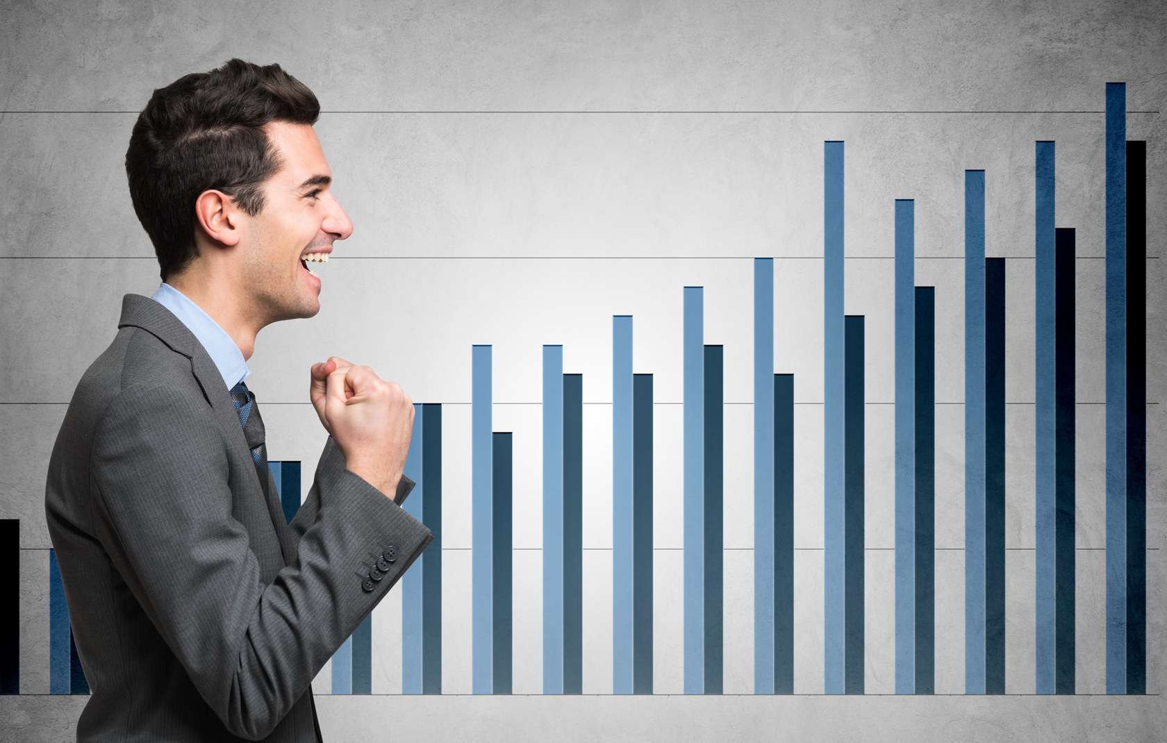 Businessman with Rising Graphs Statistics